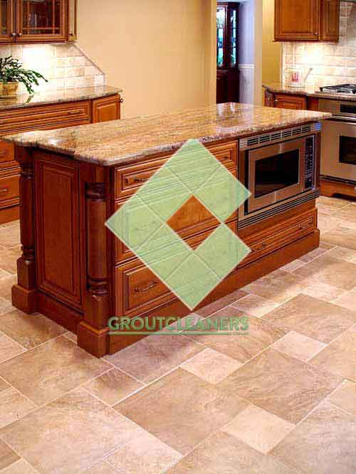 traditional_kitchen_with_various_size_porcelain_floor_tiles_laid_in_a_step_over_pattern