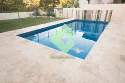 outdoor_travertine_tiles_around_pool_sealing